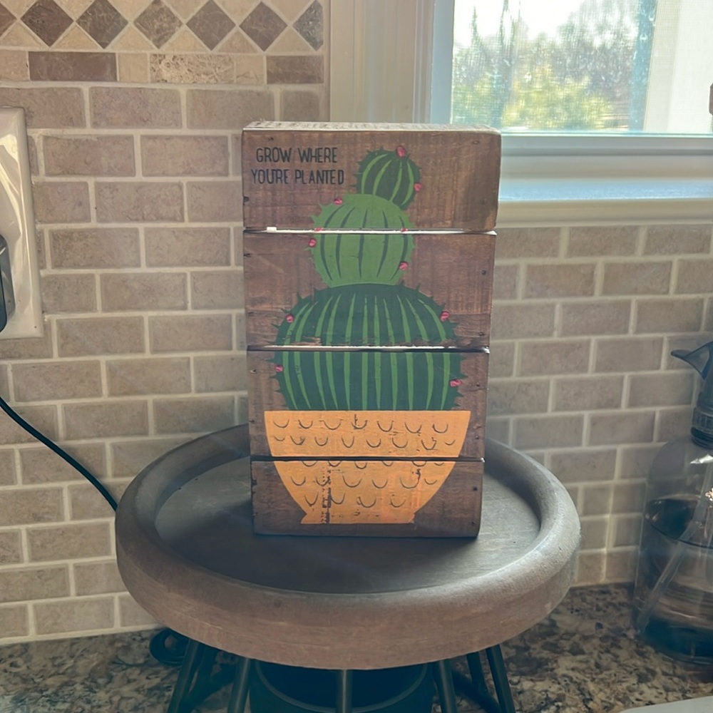 “Grow where you’re planted” wood sign